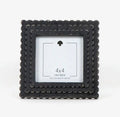 Beautiful black square wood picture frame.   Holds 4” x 4” x 1” picture.